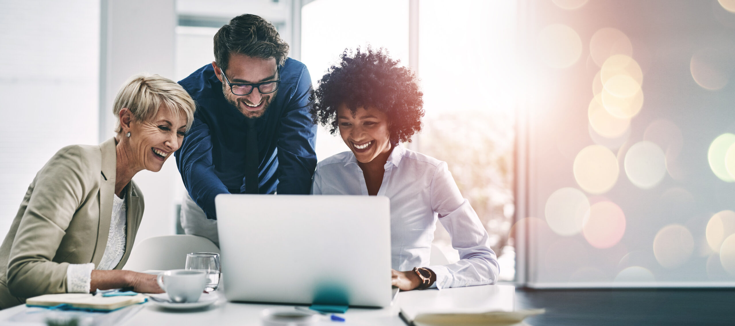 business-people-laptop-meeting-coaching-planning-teamwork-project-bokeh-background-office-group-happy-employees-working-computer-schedule-plan-ideas-team-strategy