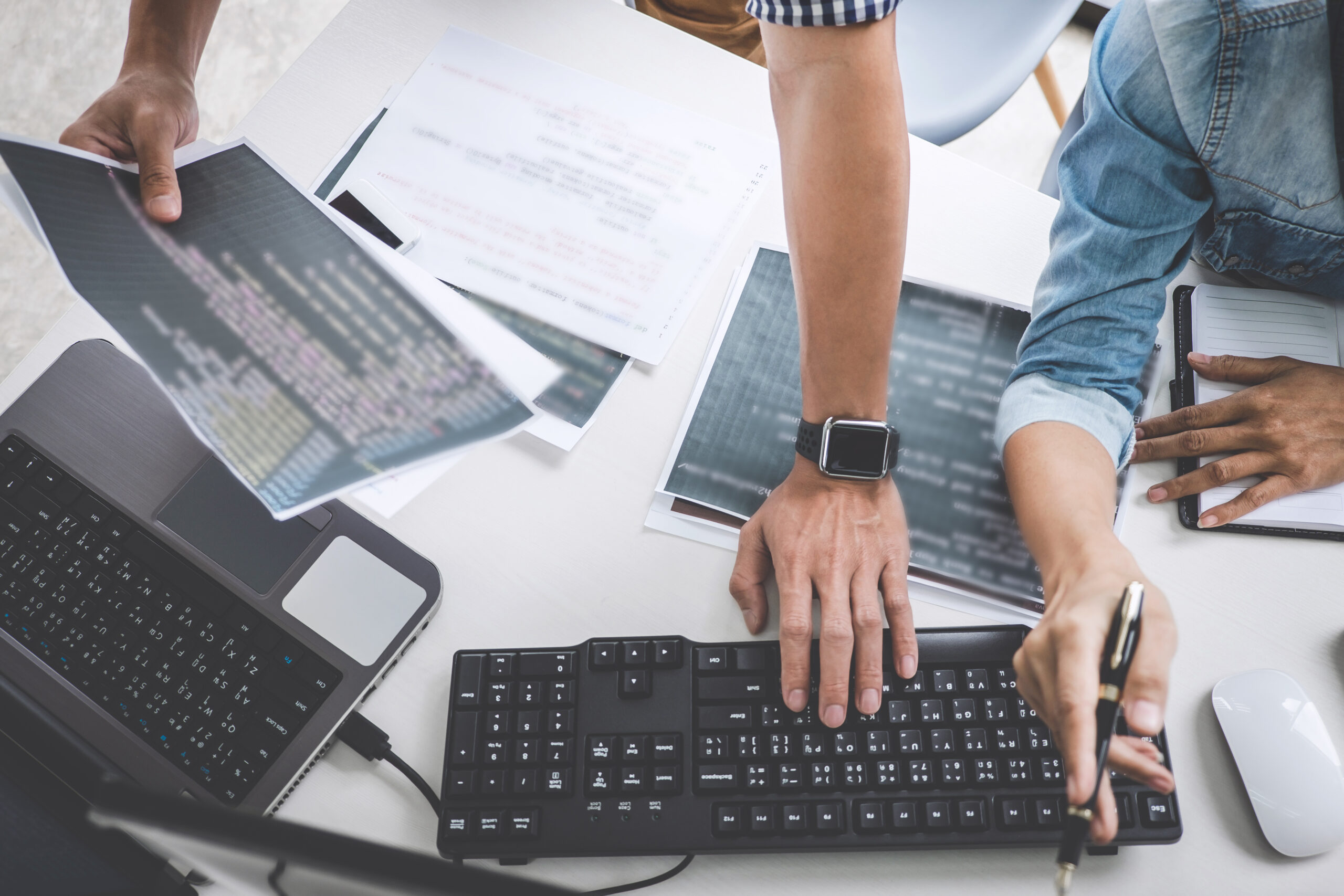 Programmers cooperating at Developing programming and website wo